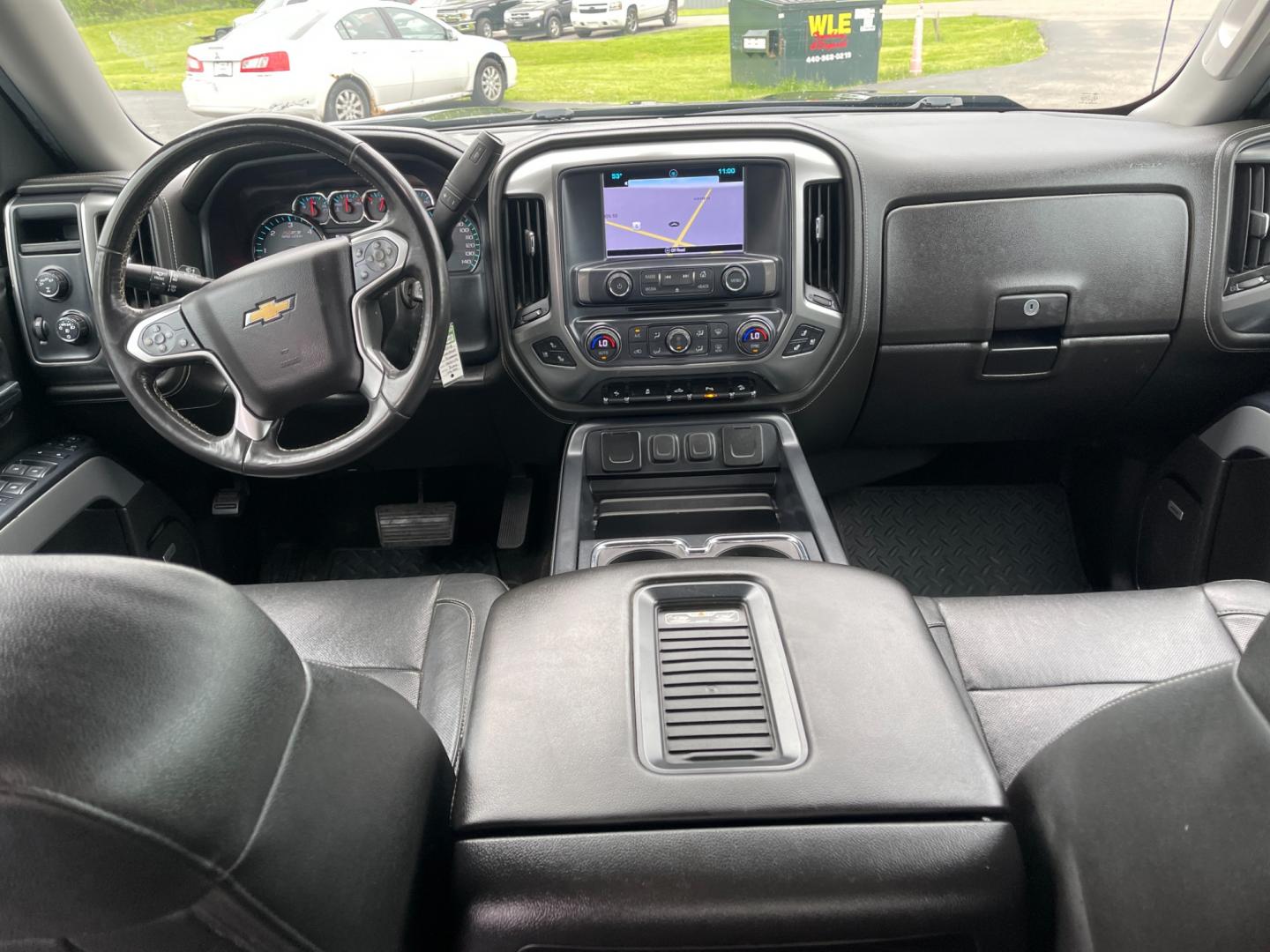 2018 Black /Black Chevrolet Silverado 1500 LTZ Z71 Crew Cab 4WD (3GCUKSEC4JG) with an 5.3L V8 OHV 16V engine, 8-Speed Automatic transmission, located at 547 E. Main St., Orwell, OH, 44076, (440) 437-5893, 41.535435, -80.847855 - This 2018 Chevrolet Silverado 1500 LTZ Z71 Crew Cab is a well-appointed and highly capable full-size pickup. It's powered by a 5.3L Vortec V8 engine paired with an 8-speed automatic transmission and 3.42 gearing, enabling an impressive 9,300-pound towing capacity. The Z71 off-road package includes f - Photo#40